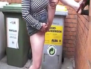 Red-hot chick pissing on public place