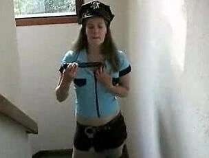 The dame is wearing a police officerТ‘s uniform and