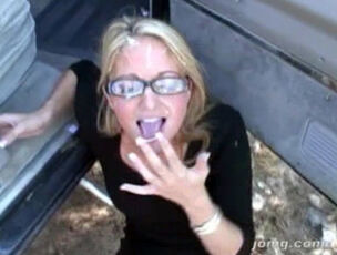 Blond wifey in glasses gets dirty facial pop-shot near the