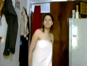 Indian bombshell doll dancing in towel after douche